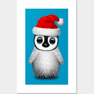 Baby Penguin Wearing a Santa Hat Posters and Art